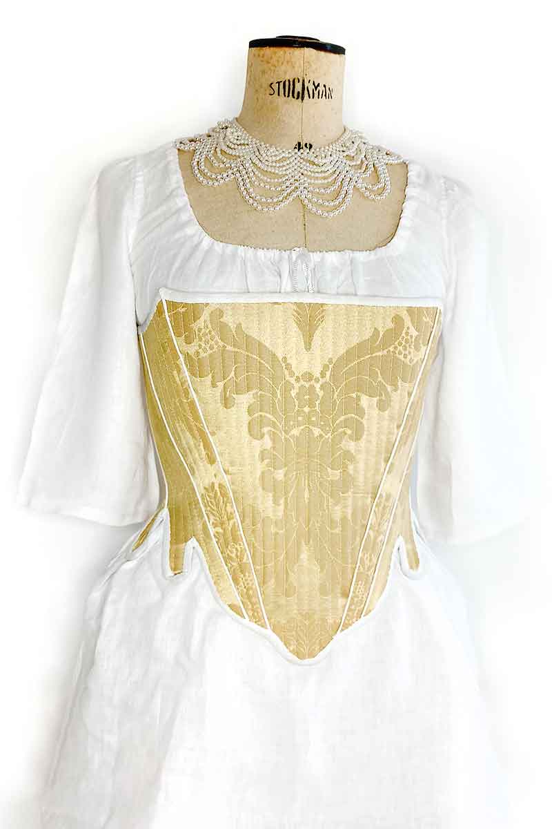 corset, ou corps baleiné, stays 18e siècle est en magnifique jacquard jaune avec des passepoils et biais blanc qui soulignent les formes